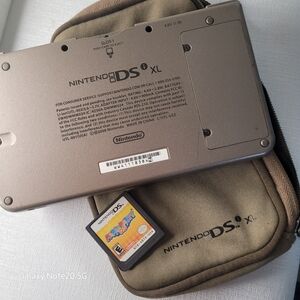 Nintendo DSi XL Handheld System Trio, Carrying Case & MarioParty DSGame Cartridg